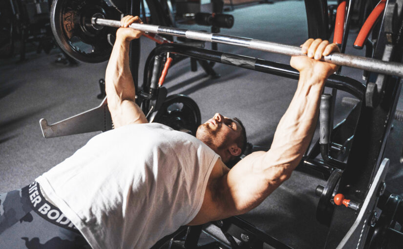 man bench pressing